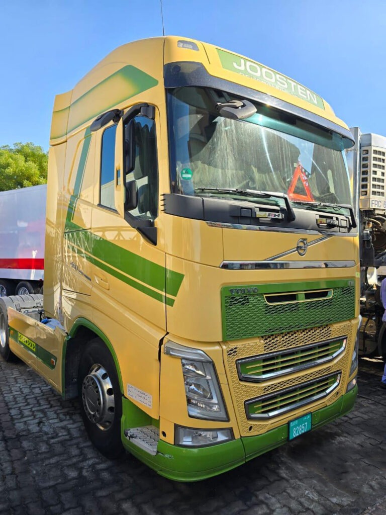 TAY cargo containers at port ready for export and supply chain distribution.