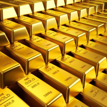 Pure gold bars bullion stacked for investment and international gold trading